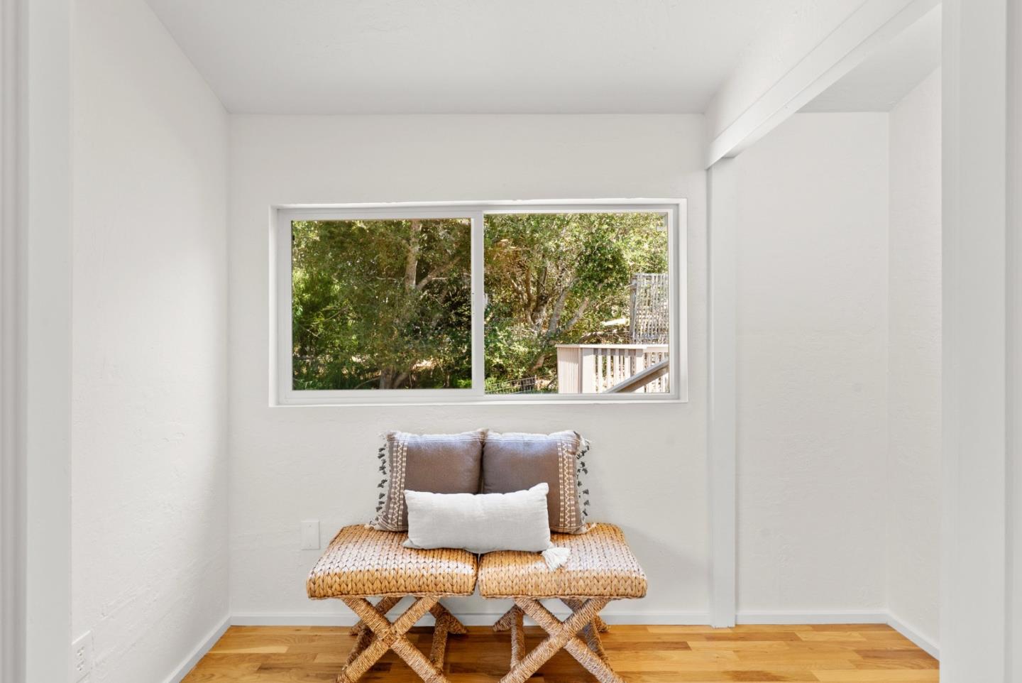 3407 Maplethorpe Lane Soquel, CA 95073 - Photo 35 of 52 a living room with a window and a wooden floor