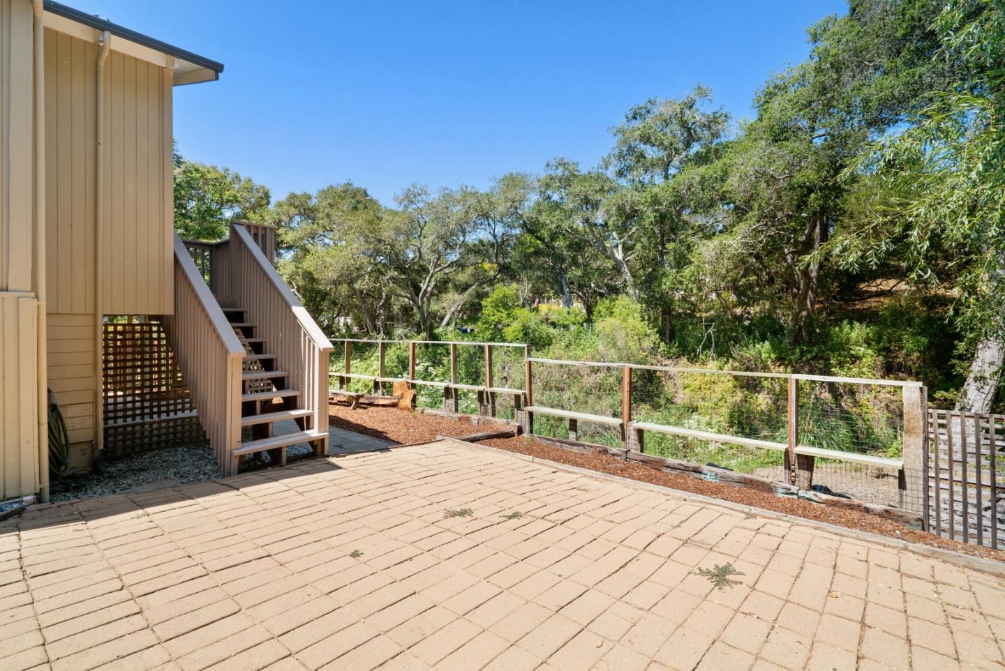 3407 Maplethorpe Lane Soquel, CA 95073 - Photo 46 of 52 a view of a balcony with chairs and wooden floor