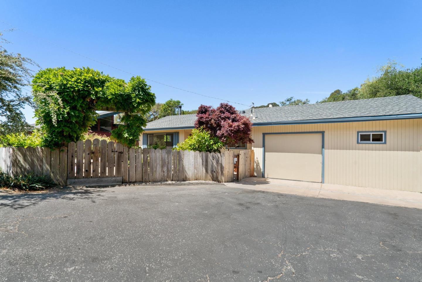 3407 Maplethorpe Lane Soquel, CA 95073 - Photo 47 of 52 a view of a house with a garage