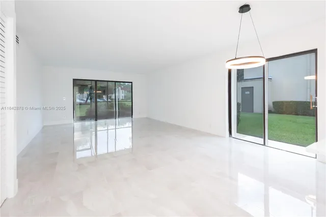 a view of an empty room with window