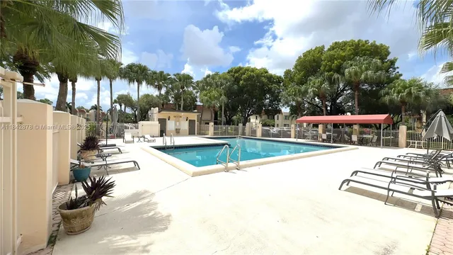 a sign board with a parking space