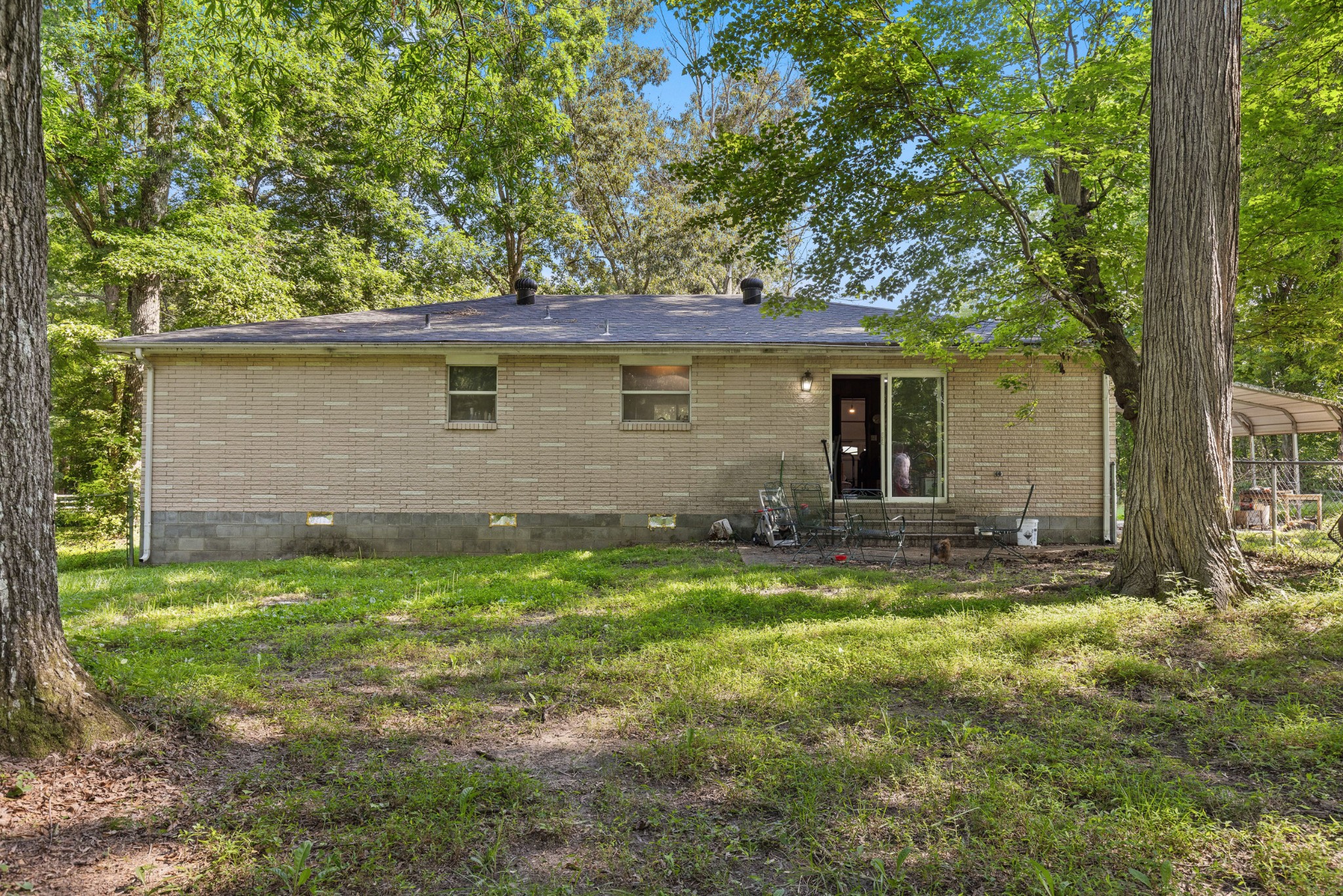 2262 Pleasant View Road Pleasant View, TN 37146 - Photo 15 of 25 a view of a house with backyard and sitting area