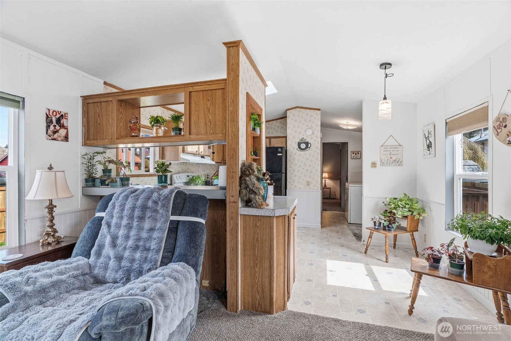 1006 Northwest Mill Street Winlock, WA 98596 - Photo 11 of 22 a living room with furniture and a potted plant