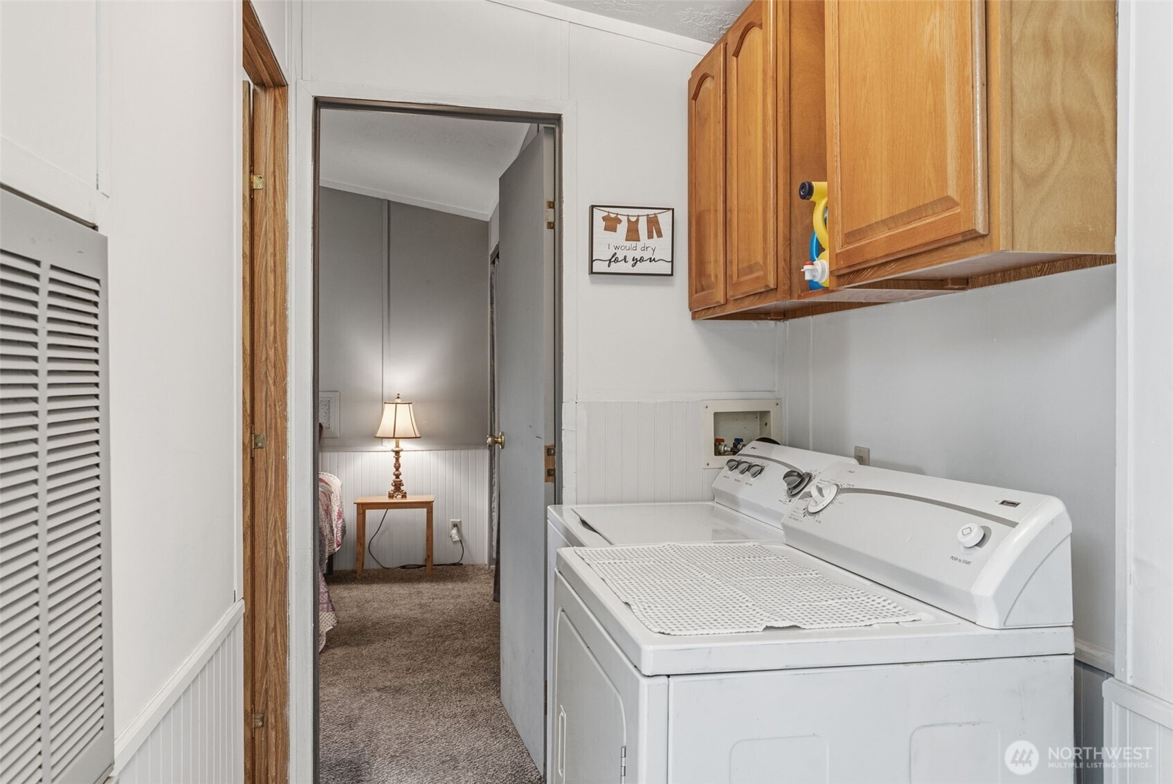 1006 Northwest Mill Street Winlock, WA 98596 - Photo 14 of 22 a view of a sink and utility room with washer and dryer