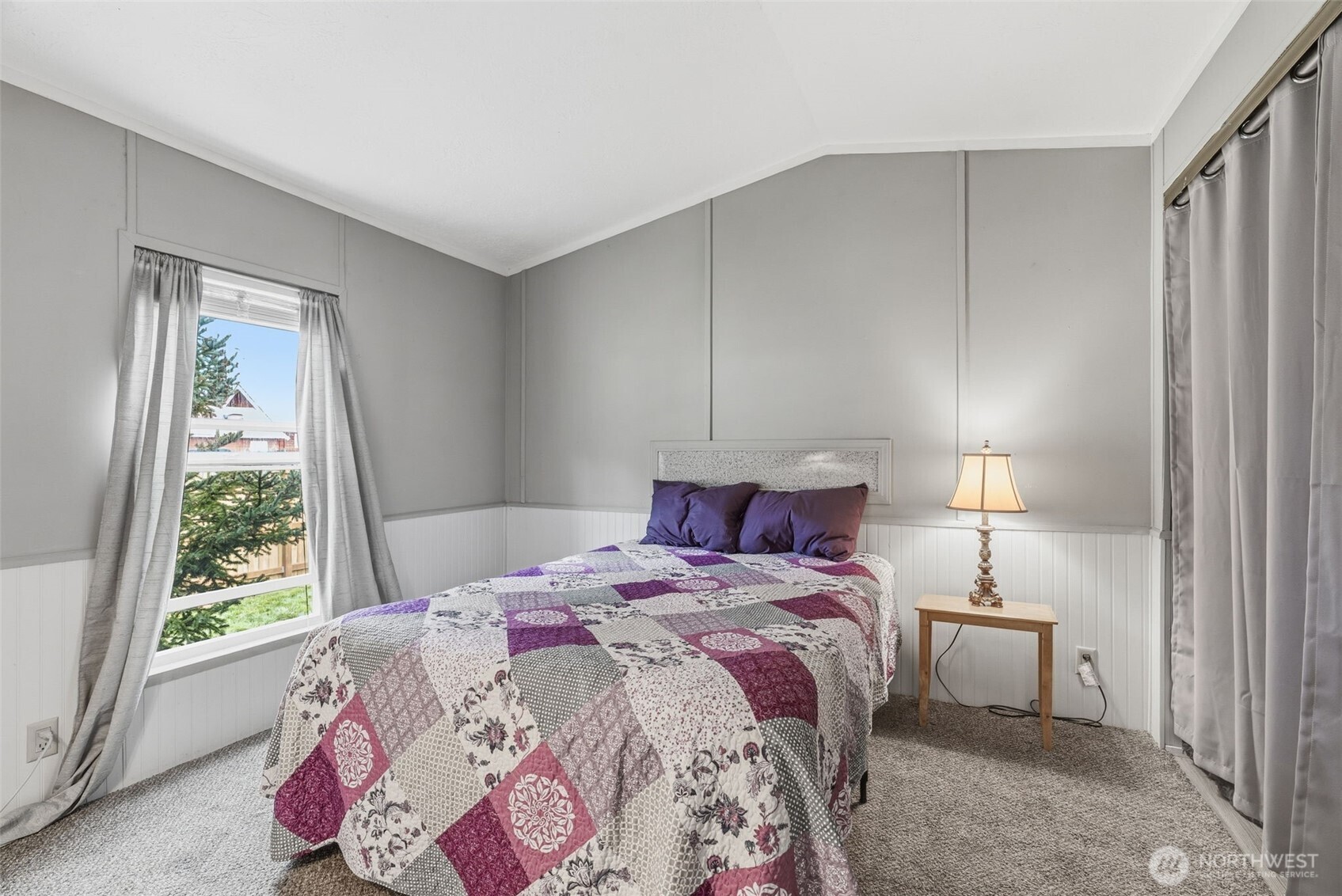 1006 Northwest Mill Street Winlock, WA 98596 - Photo 16 of 22 a bedroom with a bed and a window