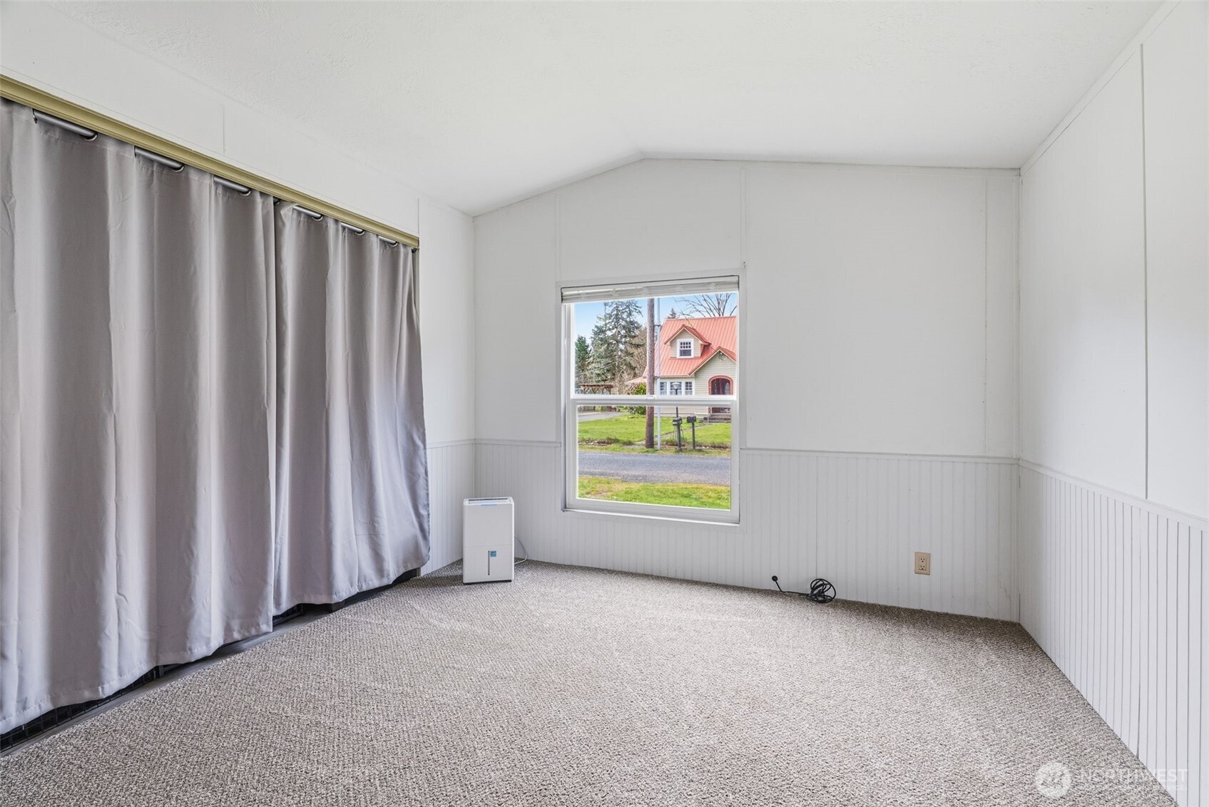 1006 Northwest Mill Street Winlock, WA 98596 - Photo 5 of 22 a view of an empty room with a window