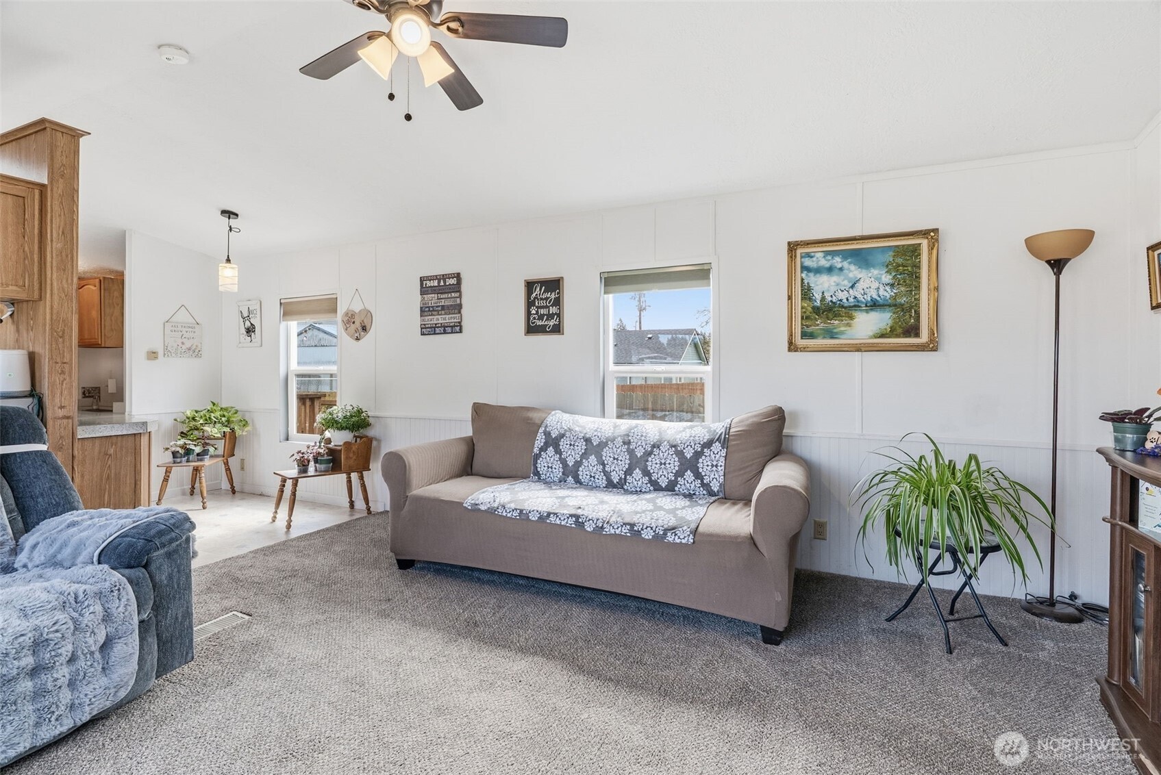 1006 Northwest Mill Street Winlock, WA 98596 - Photo 7 of 22 a living room with furniture and a chandelier