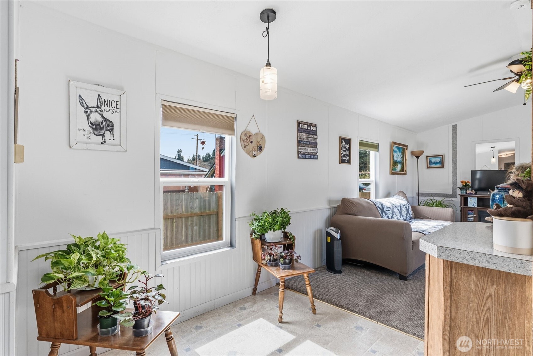 1006 Northwest Mill Street Winlock, WA 98596 - Photo 10 of 22 a living room with furniture and a potted plant