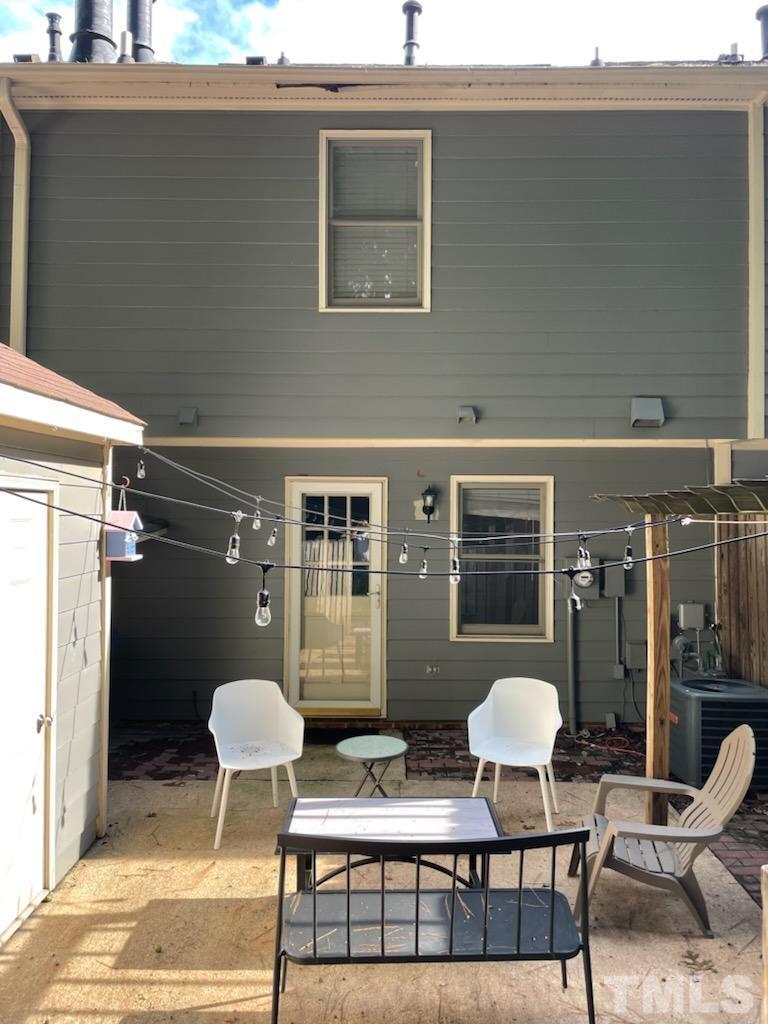 5666 Hamstead Crossing Raleigh, NC 27612 - Photo 2 of 32 a outdoor space with a couch