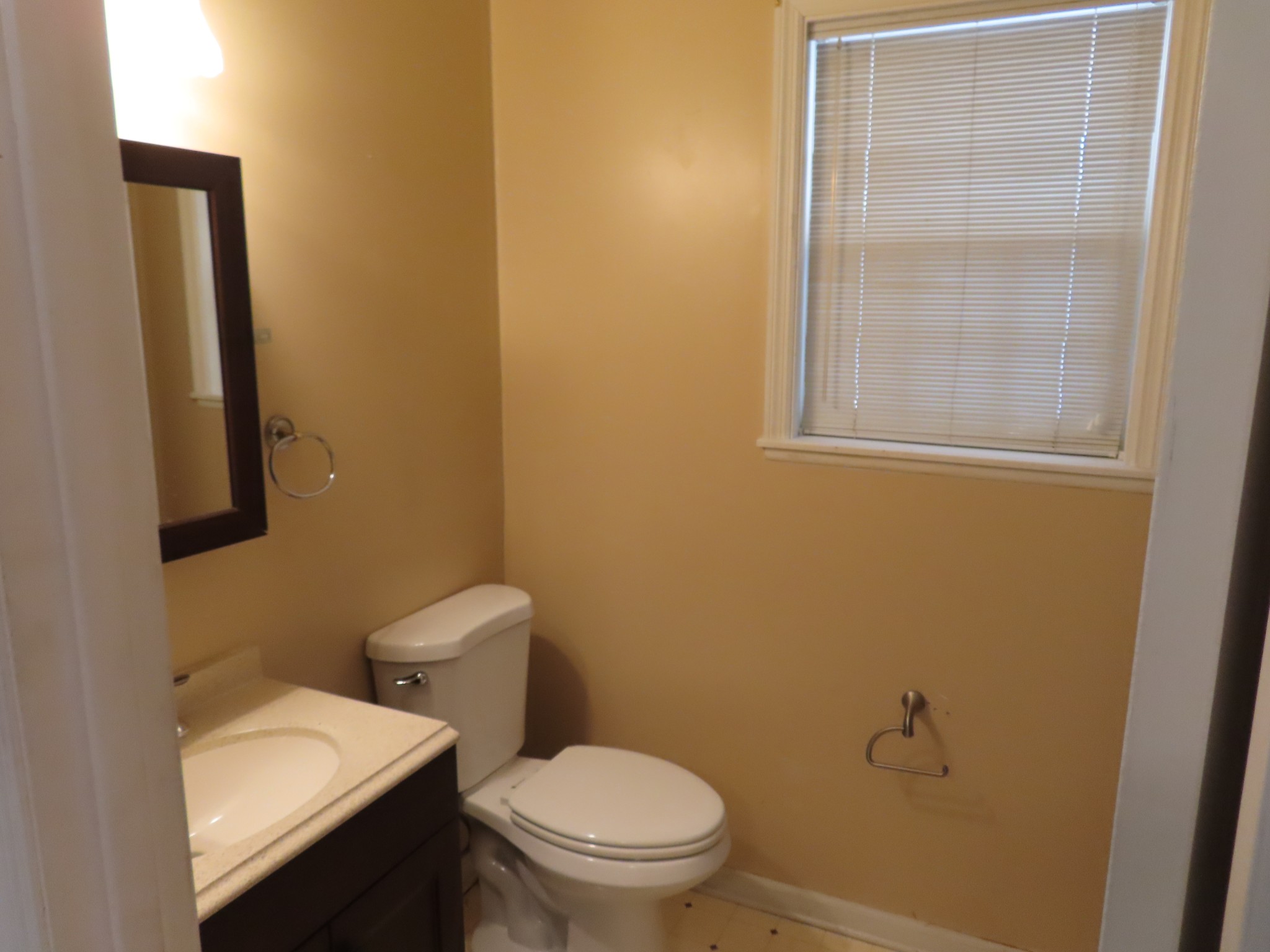 511 Bumpas Road Lawrenceburg, TN 38464 - Photo 12 of 14 a white toilet sitting next to a bathroom sink