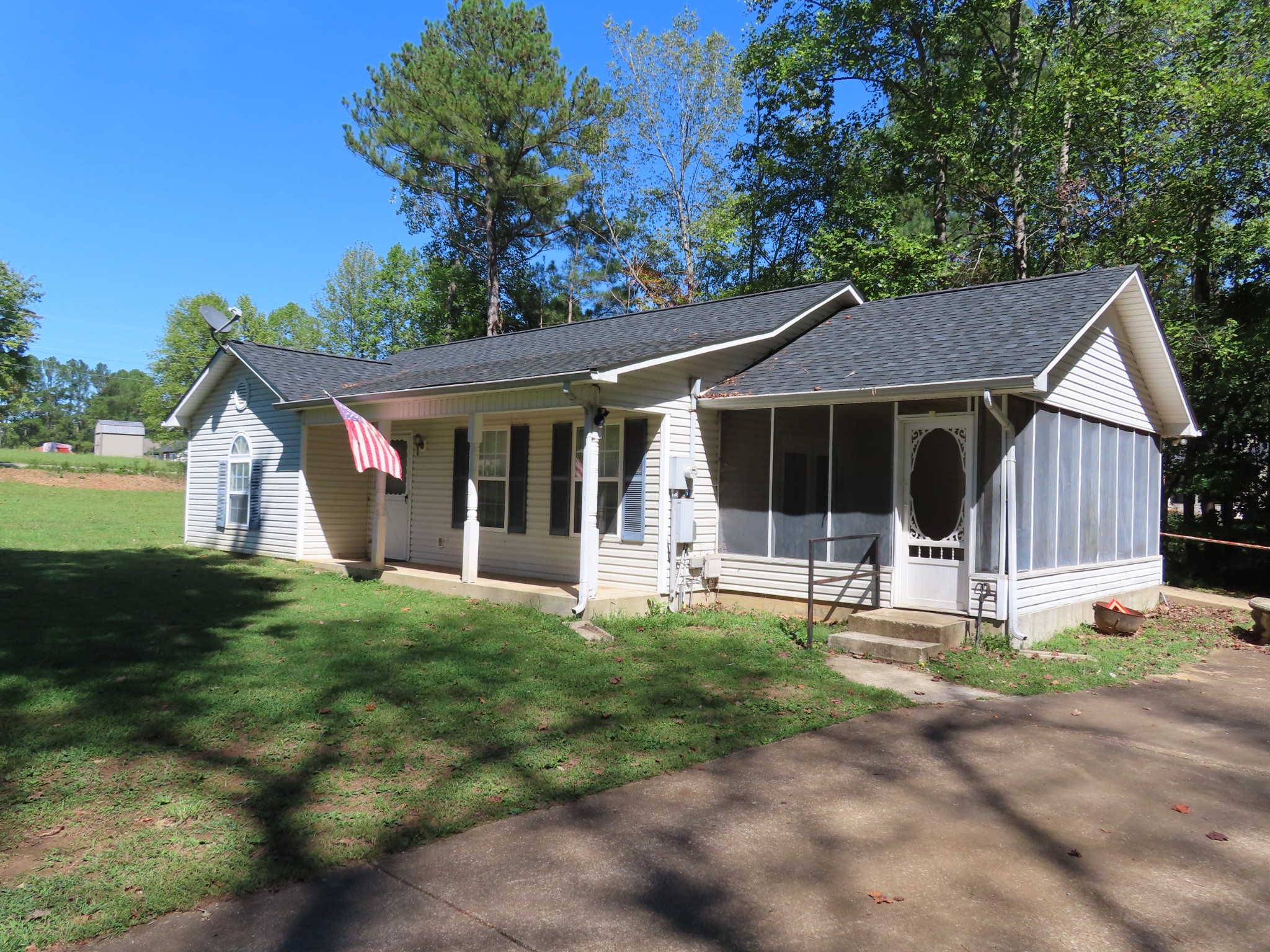 511 Bumpas Road Lawrenceburg, TN 38464 - Photo 4 of 14 a view of a house with a yard and sitting area