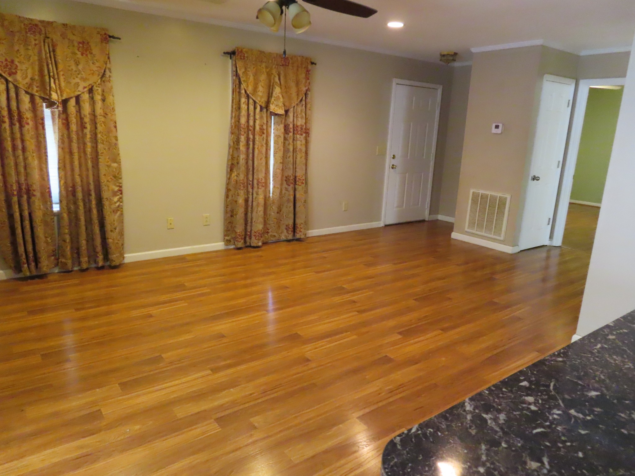 511 Bumpas Road Lawrenceburg, TN 38464 - Photo 6 of 14 a view of an empty room with wooden floor