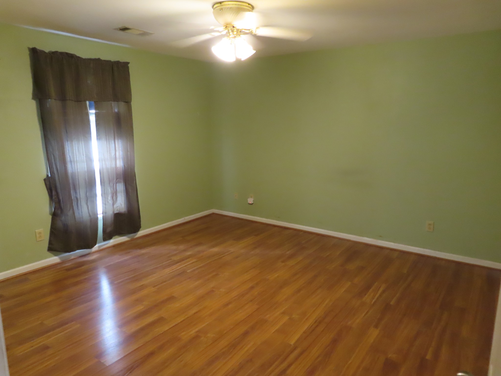 511 Bumpas Road Lawrenceburg, TN 38464 - Photo 10 of 14 a view of empty room with wooden floor
