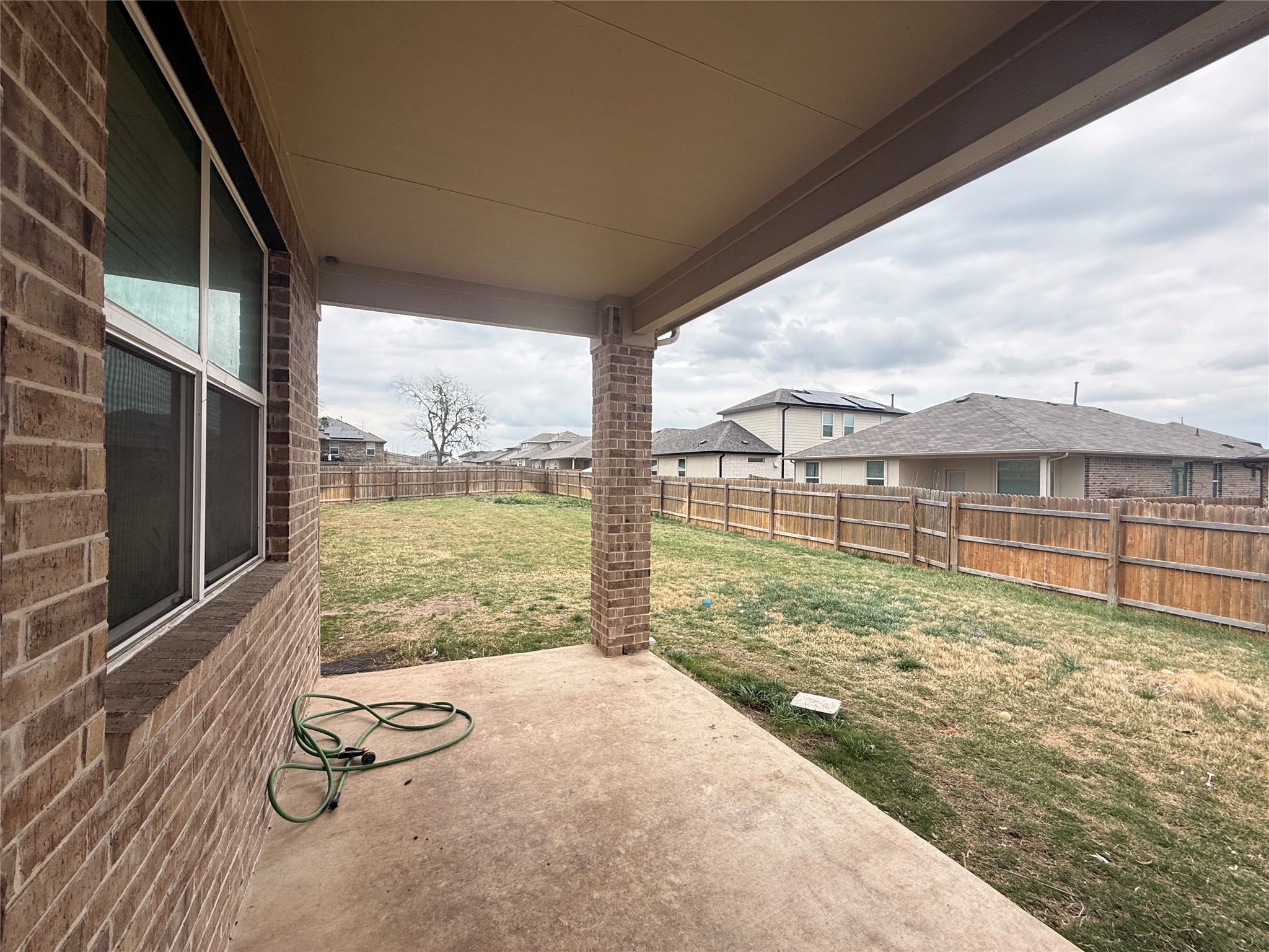 120 Calla Lane Georgetown, TX 78626 - Photo 19 of 19 Fenced backyard with a patio area