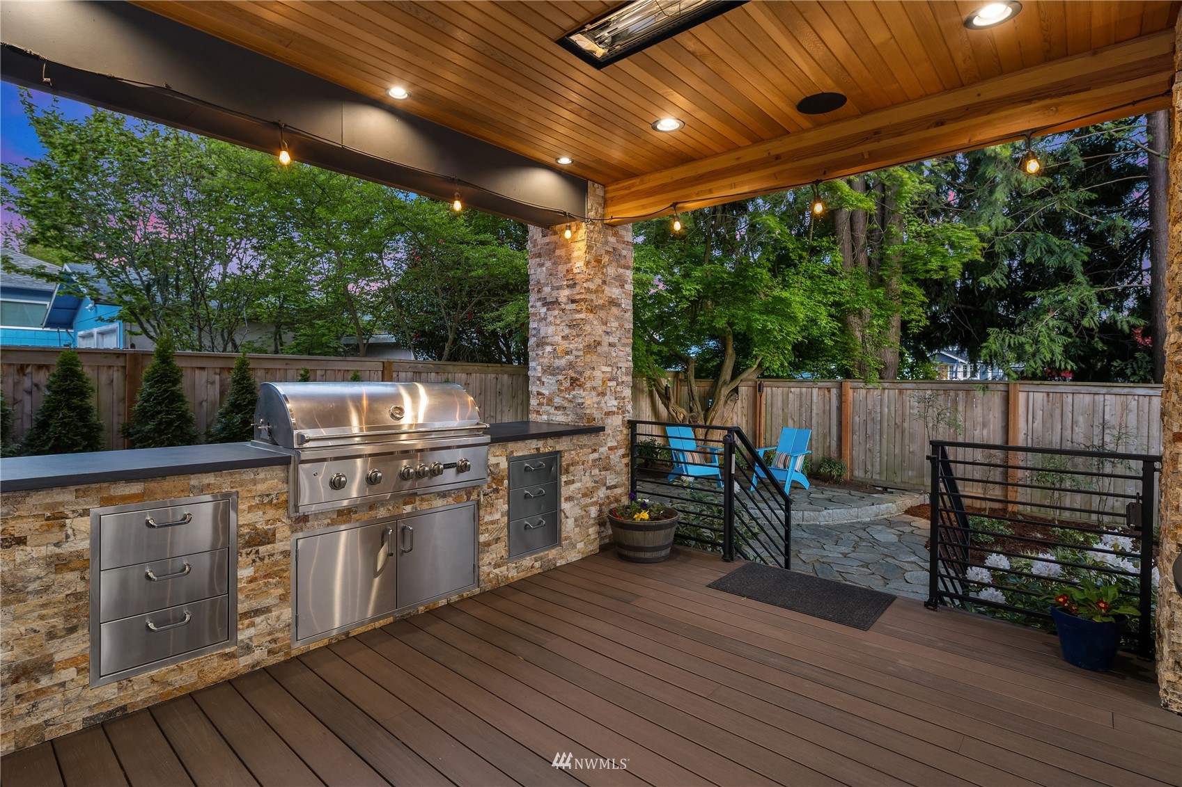 111 North 76th Street Seattle, WA 98103 - Photo 12 of 40 a open kitchen with wooden floor and outdoor seating