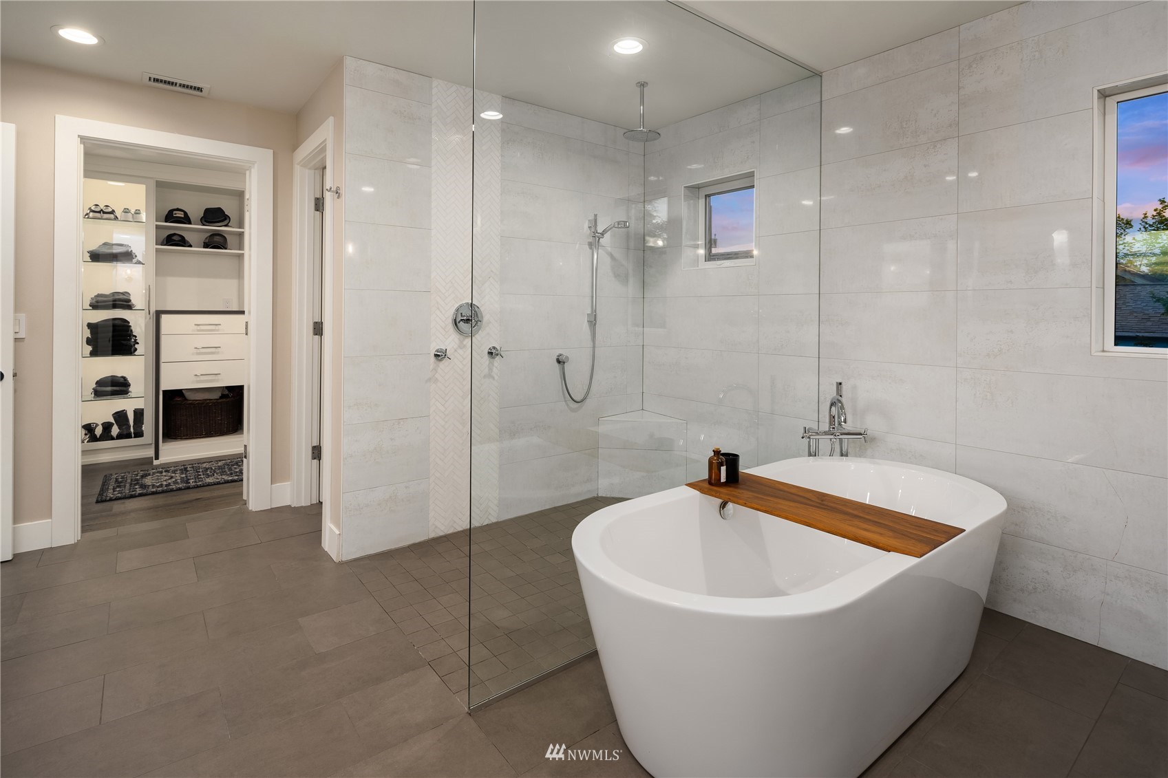 111 North 76th Street Seattle, WA 98103 - Photo 19 of 40 a white bath tub sitting in a bathroom and shower