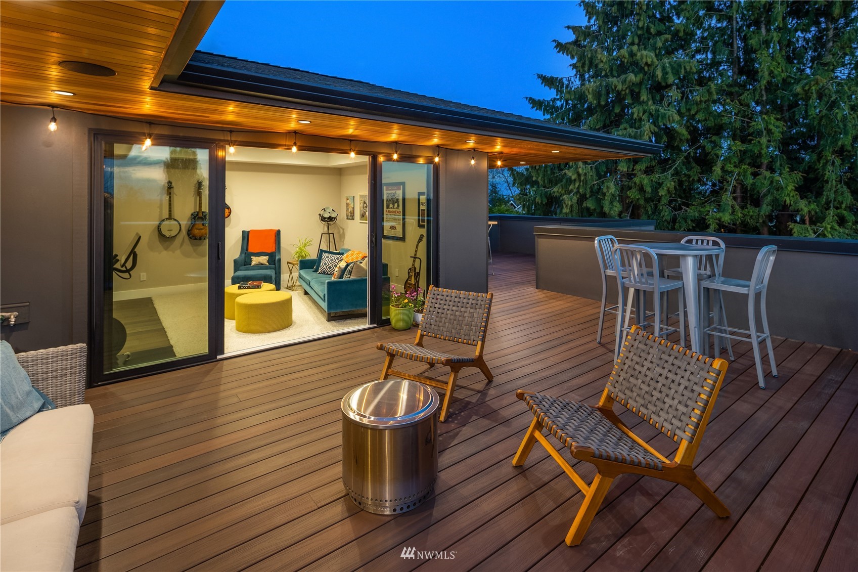 111 North 76th Street Seattle, WA 98103 - Photo 30 of 40 a view of outdoor seating space with wooden floor