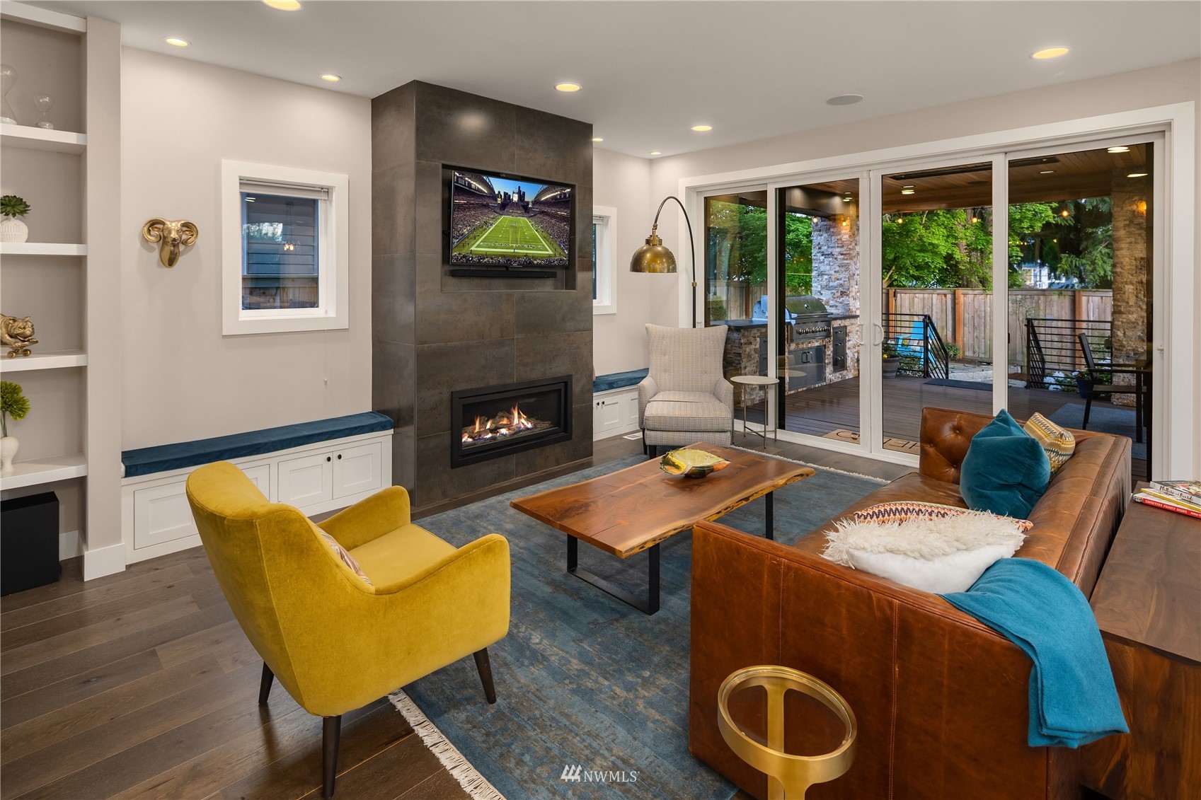 111 North 76th Street Seattle, WA 98103 - Photo 10 of 40 a living room with furniture fireplace and flat screen tv