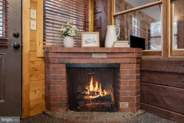 a fireplace with a wooden floor