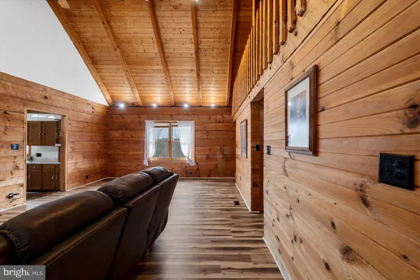 a lobby with furniture and window