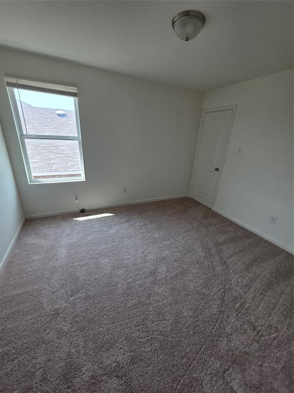 477 Bank Way Crowley, TX 76036 - Photo 20 of 39 Unfurnished room featuring carpet