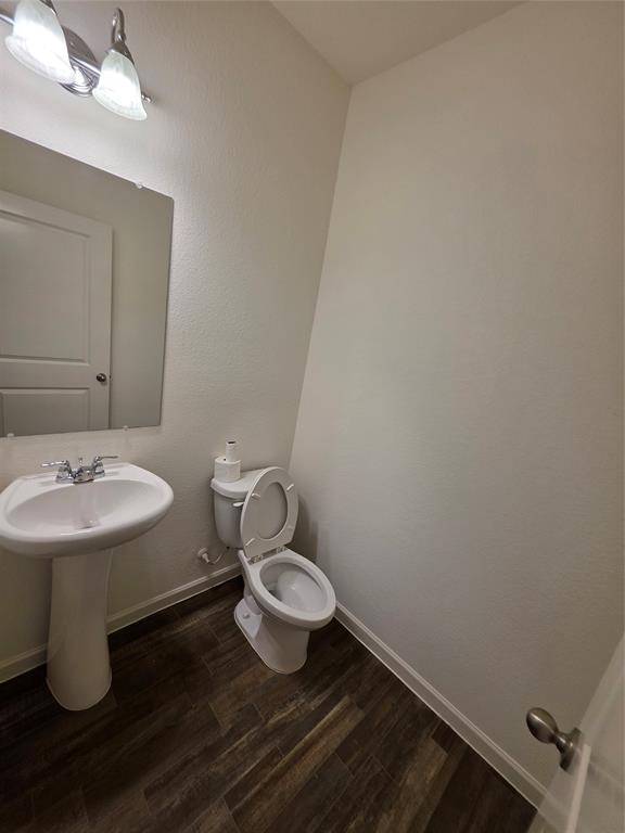 477 Bank Way Crowley, TX 76036 - Photo 24 of 39 Bathroom featuring toilet and a sink