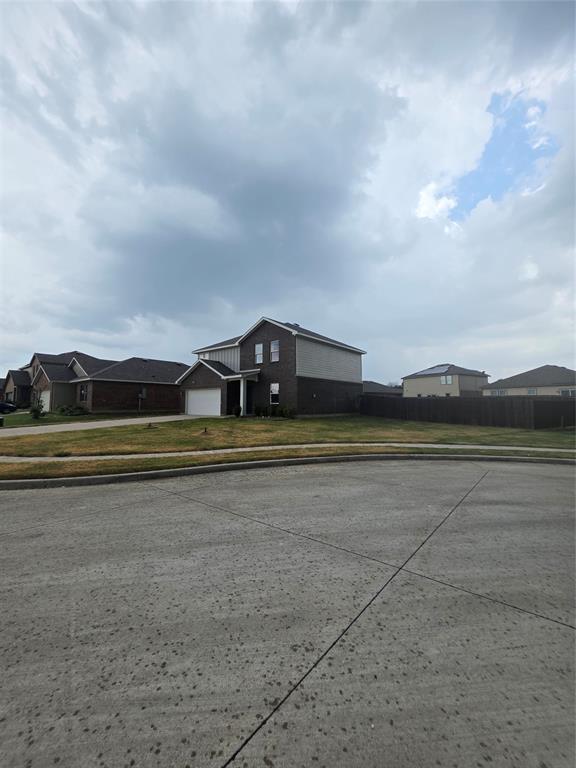 477 Bank Way Crowley, TX 76036 - Photo 37 of 39 View of concrete street featuring sidewalks and curbs