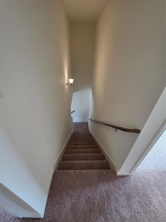 477 Bank Way Crowley, TX 76036 - Photo 9 of 39 Staircase with carpet and baseboards