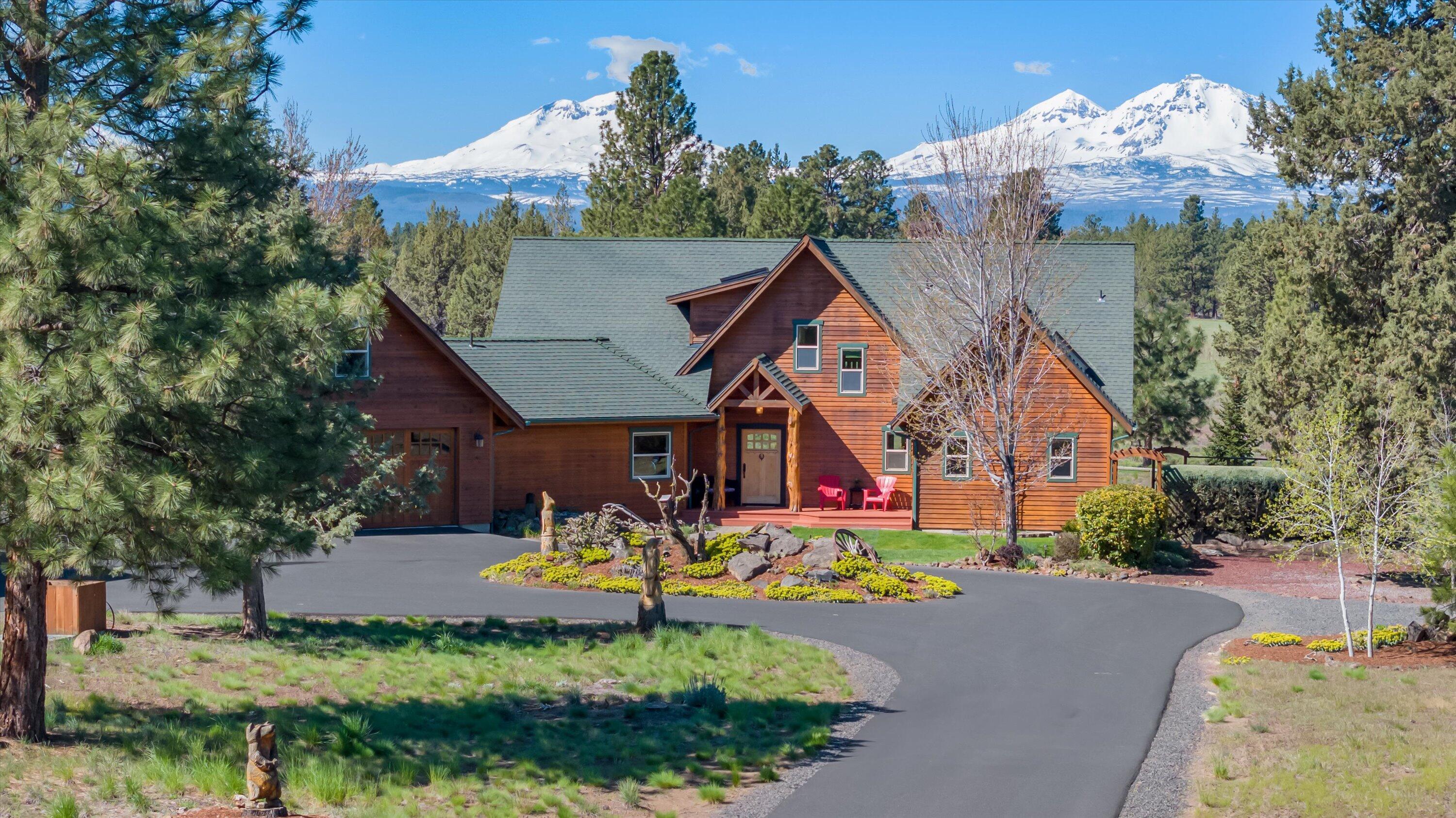 69125 Hurtley Ranch Road Sisters, OR 97759 - Photo 1 of 77 Presenting Alpenglow, with sweeping Cascade Mountain views and an abundance of charm, this gated 19.85 acre lodge style retreat offers sublime peace & privacy