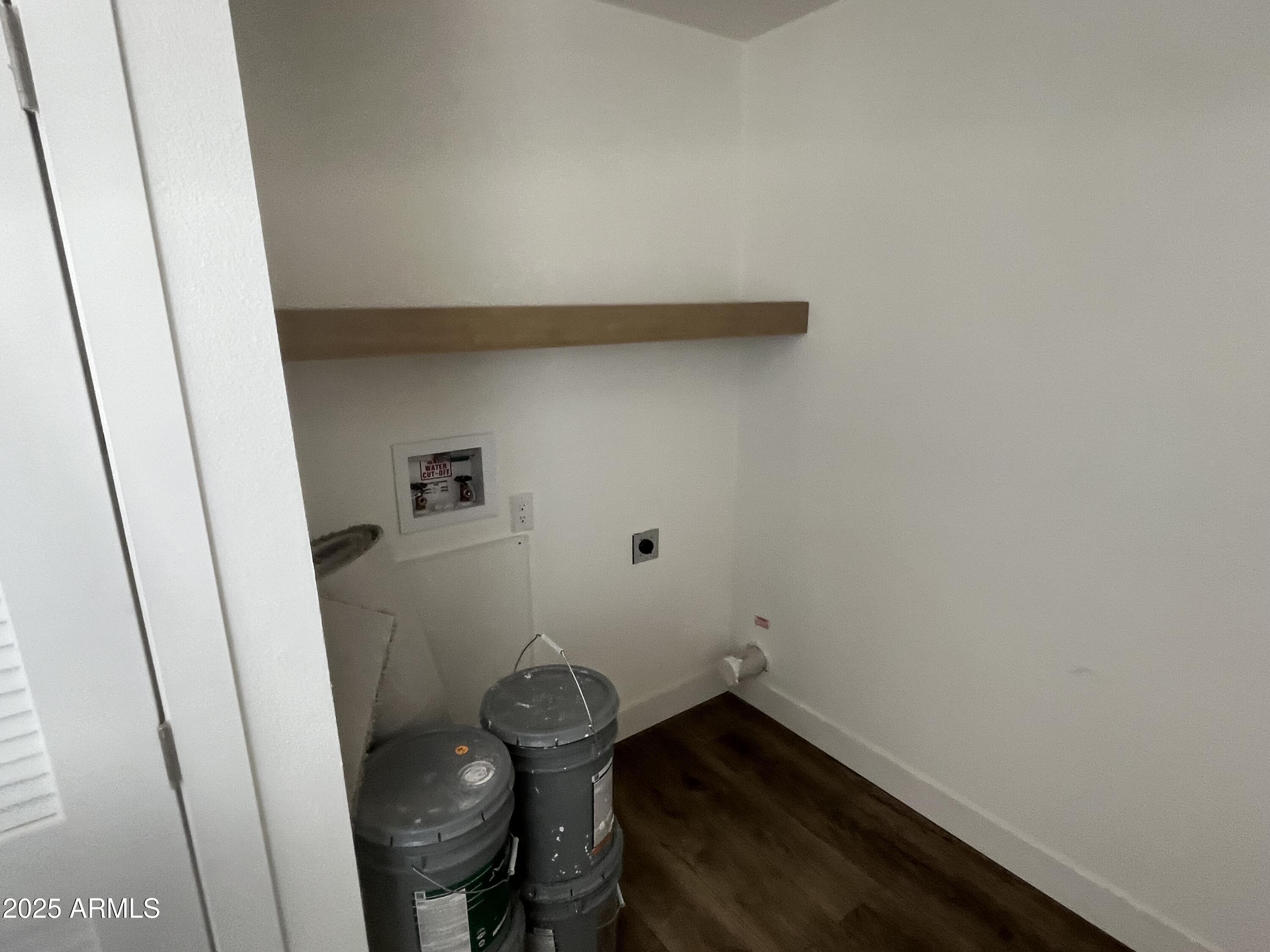 22936 West Forest Pleasant Place, Unit 2 Wittmann, AZ 85361 - Photo 13 of 17 a bathroom with a sink and a mirror
