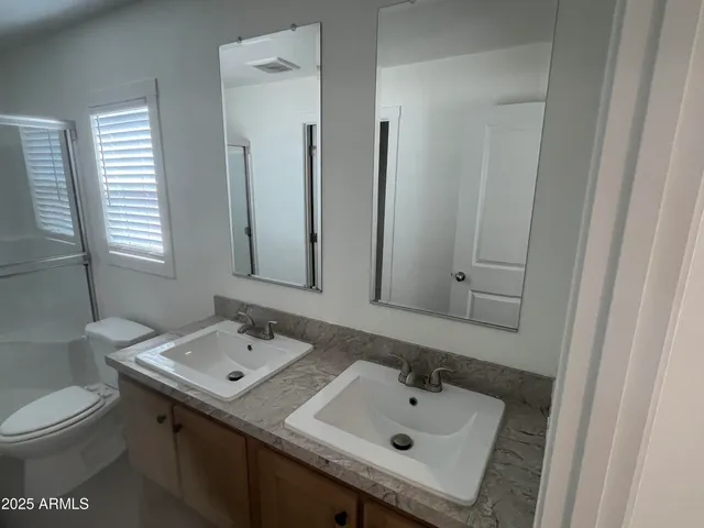 a bathroom with a sink and a toilet