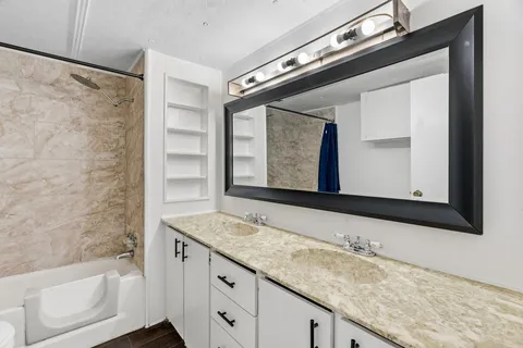 an empty room with wooden floor