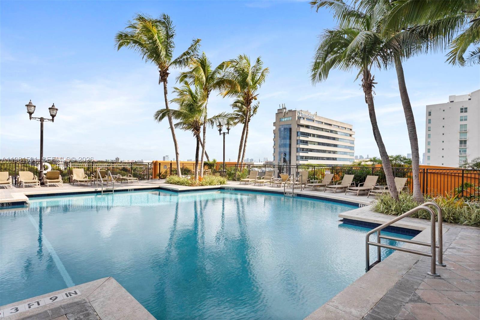 3232 Southwest 22nd Terrace, Unit PH2002 Miami, FL 33145 - Photo 29 of 35 a view of a swimming pool with a lake view
