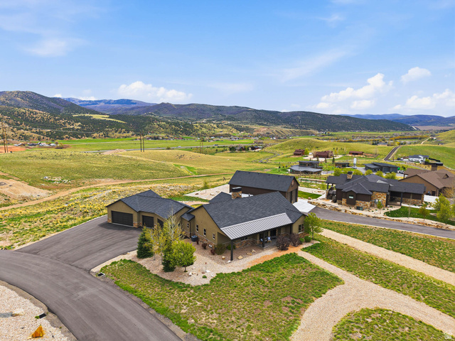 402 Shadow Hill Road Wanship, UT 84017 - Photo 3 of 90 Aerial view of property and surrounding area featuring a mountain backdrop
