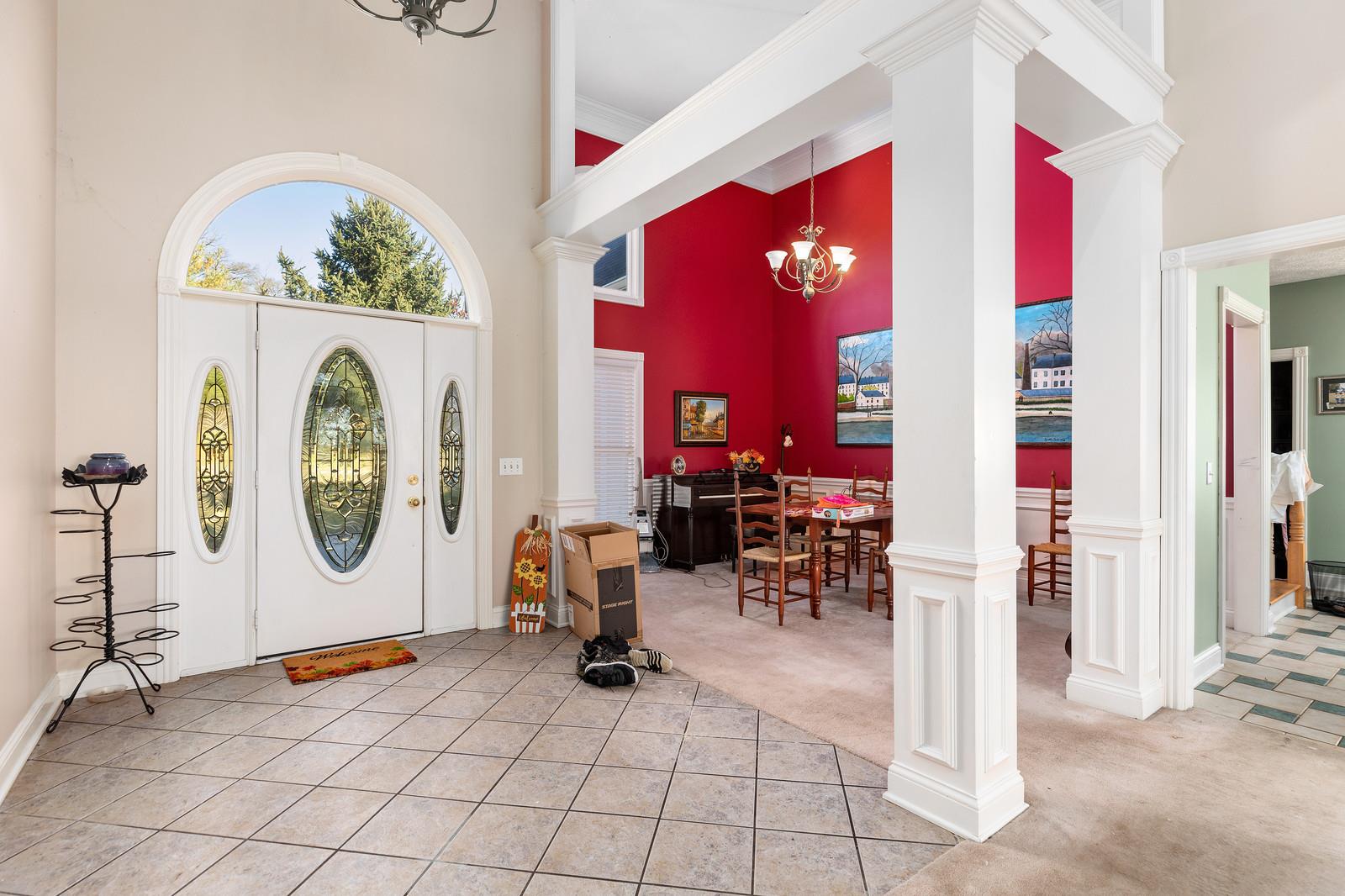 133 East Robertson Road Castalian Springs, TN 37031 - Photo 3 of 28 Regal columns separate dining area from den area.