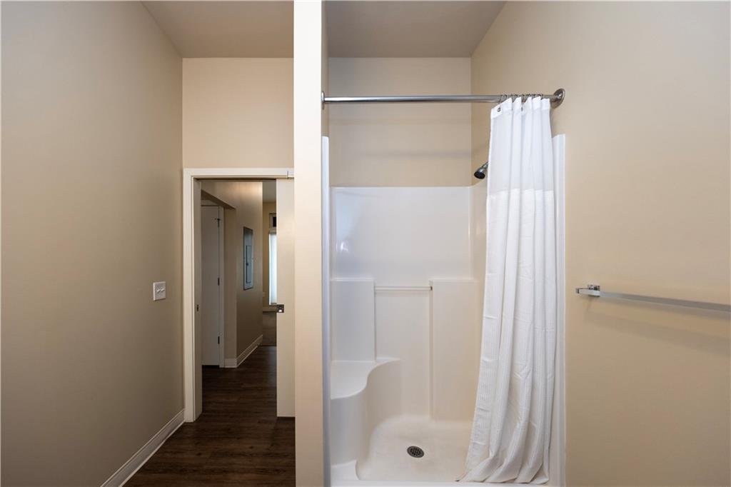 1655 Fifth Avenue, Unit 312 Pittsburgh, PA 15219 - Photo 29 of 29 a bathroom with a glass shower door