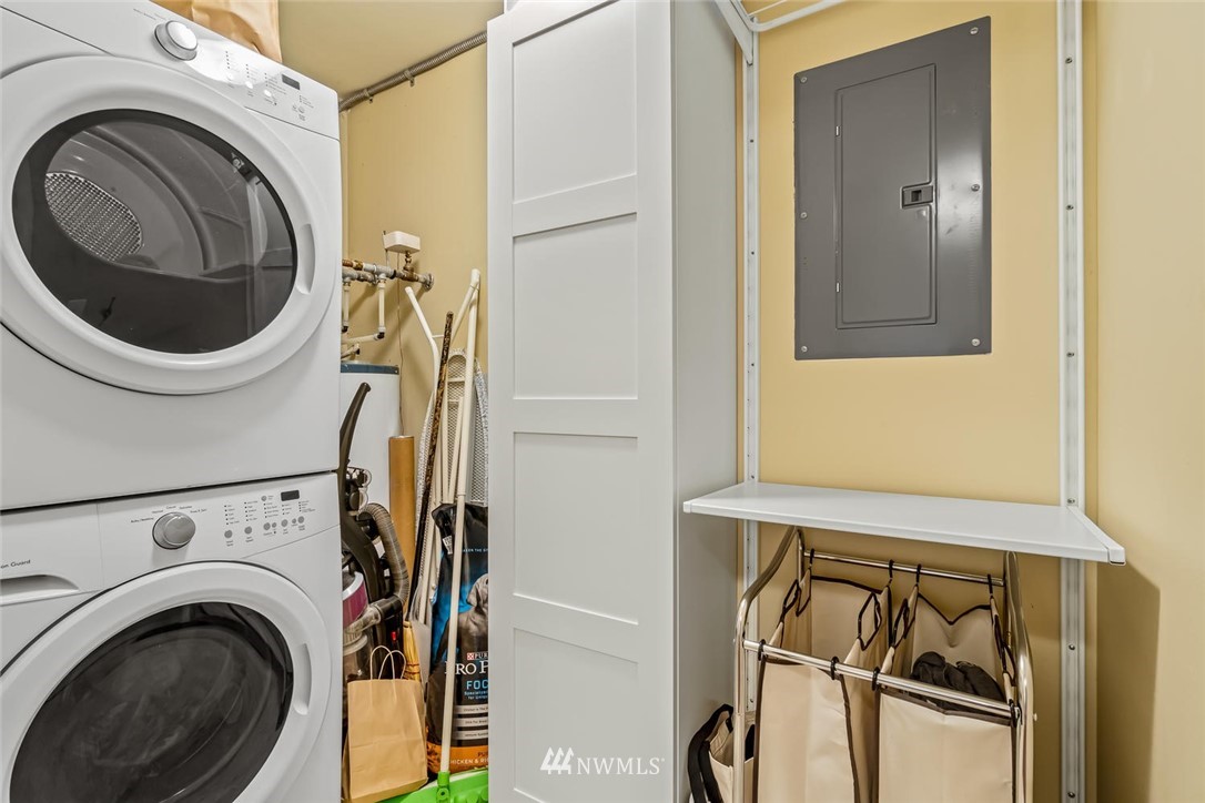 610 Aloha Street, Unit 302 Seattle, WA 98109 - Photo 17 of 27 a close view of a utility room with dryer and washer