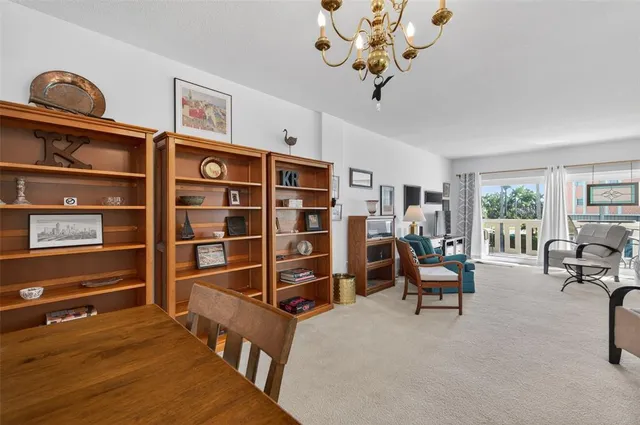 a bedroom with a large bed and a couch