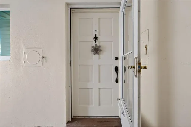 a view of a balcony with chairs