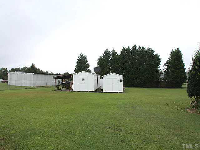 2277 Polenta Road Clayton, NC 27520 - Photo 12 of 13 Three storage buildings!