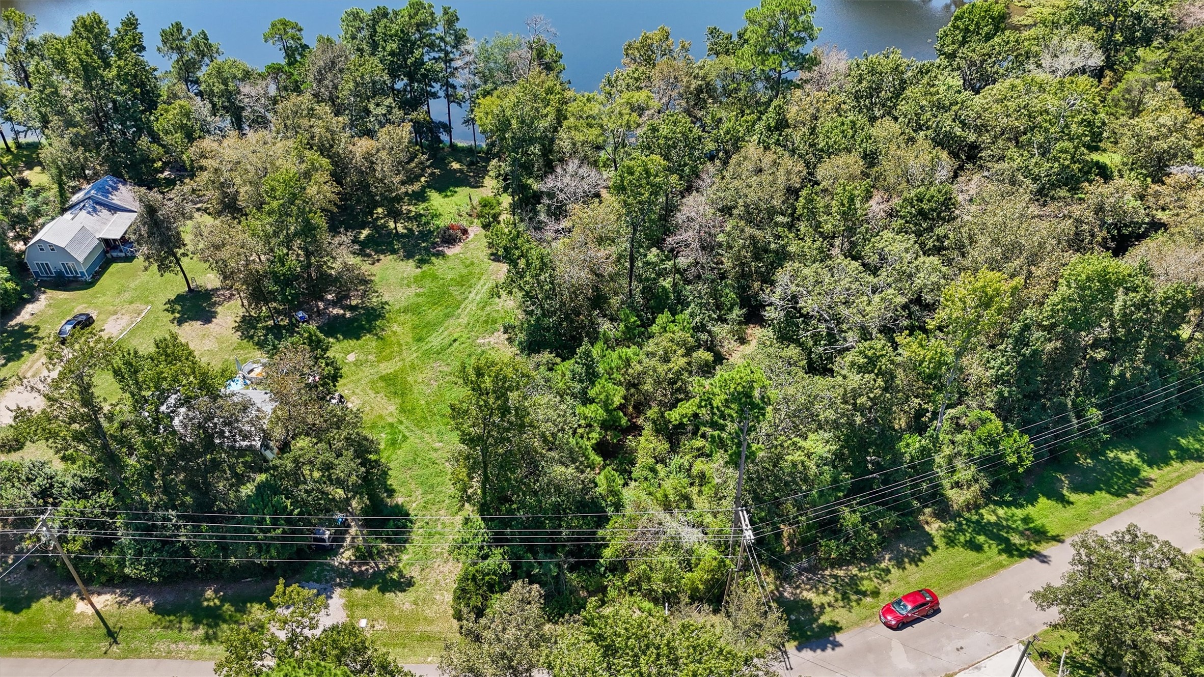 3816 Sam Houston Road Houston, TX 77002 - Photo 1 of 19 an aerial view of residential house with outdoor space and trees all around