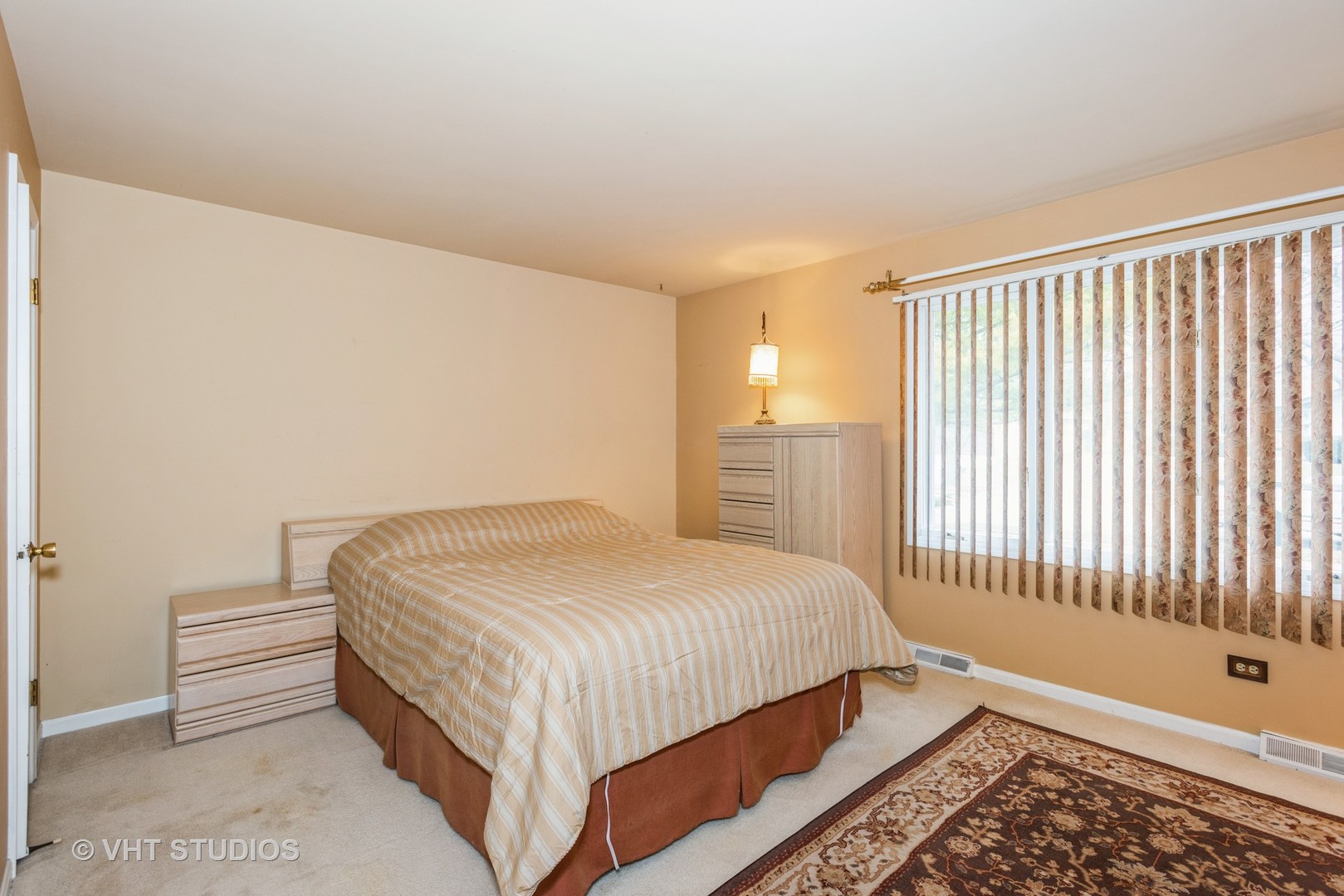 7 Green Ridge Road Elgin, IL 60120 - Photo 9 of 11 a bedroom with a bed and a window
