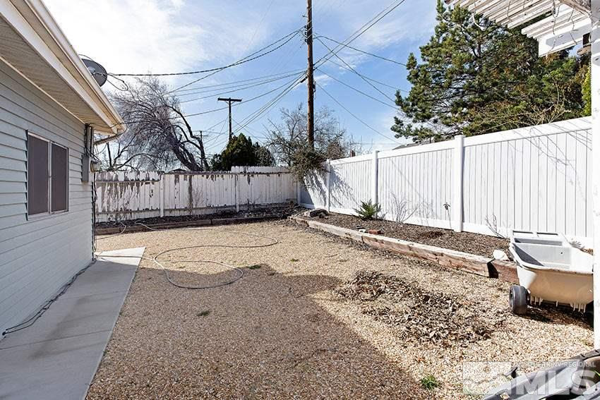 725 Reeves Avenue Reno, NV 89503 - Photo 14 of 15 a view of a backyard of the house