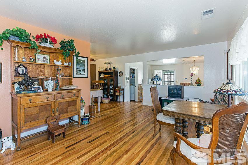 725 Reeves Avenue Reno, NV 89503 - Photo 3 of 15 a view of a dining room with furniture and wooden floor