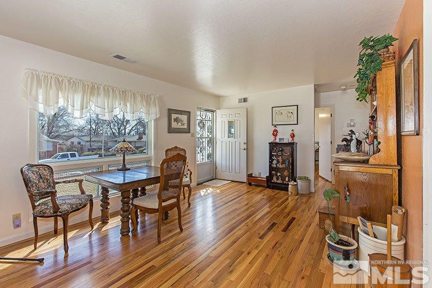 725 Reeves Avenue Reno, NV 89503 - Photo 4 of 15 a dining room with furniture and wooden floor