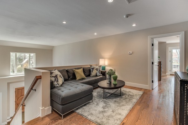 265 Woodland Road Brookline, MA 02467 - Photo 17 of 30 a living room with furniture and a hard wood floor