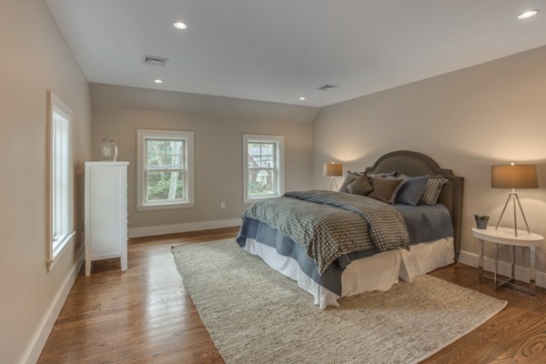 265 Woodland Road Brookline, MA 02467 - Photo 22 of 30 a bedroom with a large bed and a window