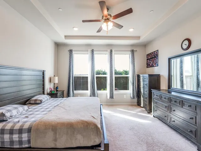 a large bathroom with a double vanity sink and a mirror