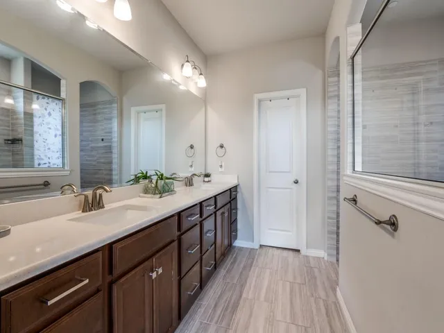 a view of a livingroom with workspace and a window