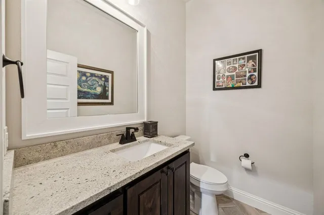 a utility room with sink dryer and washer